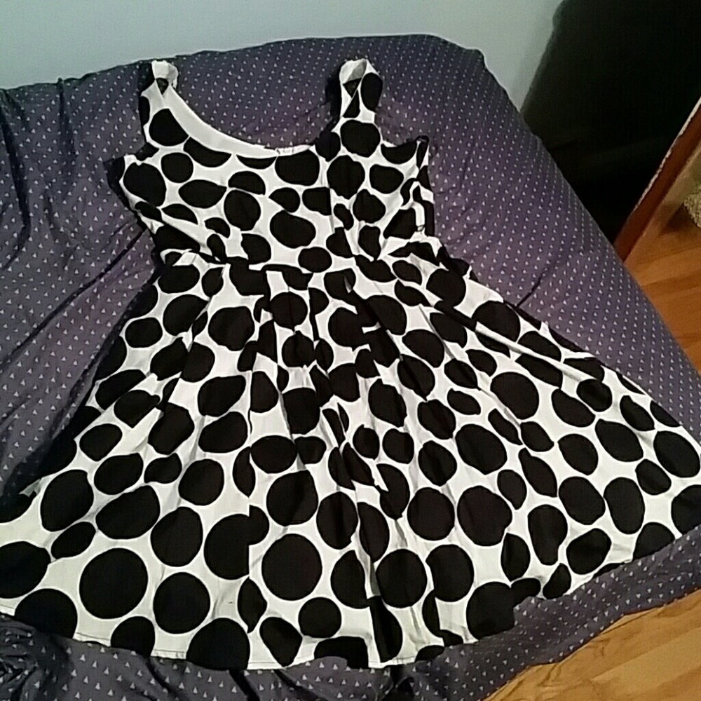White vintage-y dress with navy polka dots